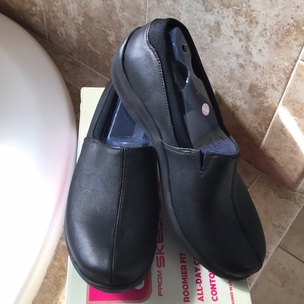 Skechers leather slip on shoes with memory foam.